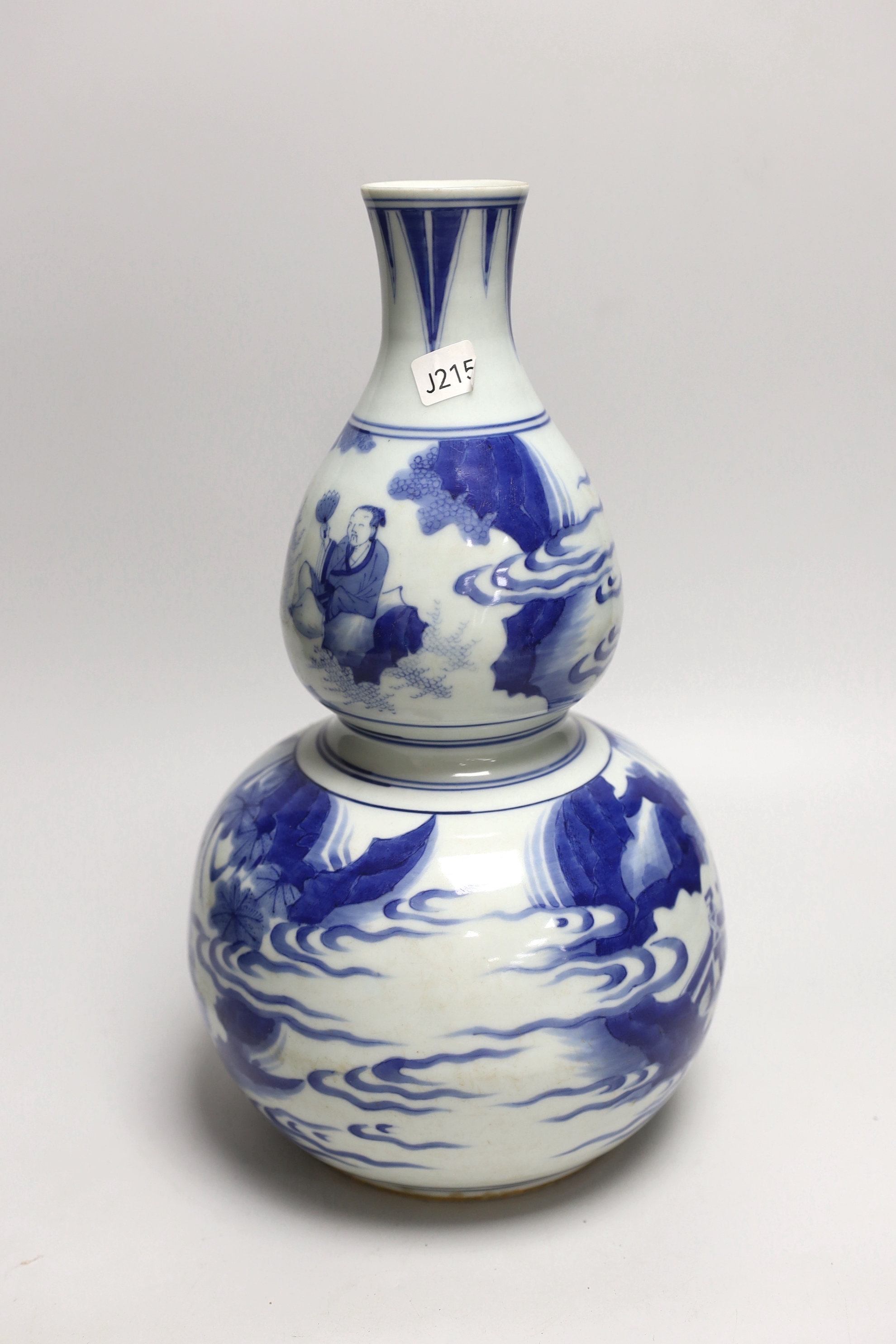 A Chinese blue and white double gourd vase, 33cm